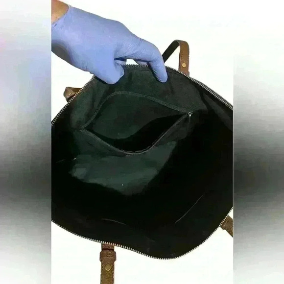 A black & brown Fossil Rachel top zipper closure tote bag. - Picture 7 of 12